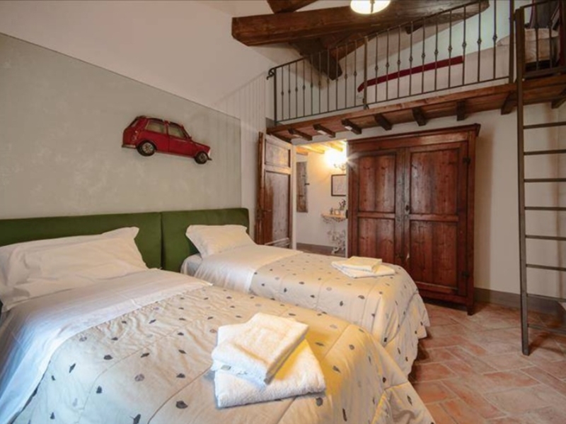 Group accommodation Podere Fonteinfrancia Family room