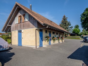 Group accommodation Camping Wagenhausen Schwalbennestli House view summer