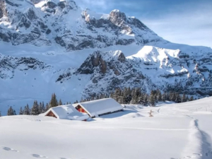 Chalet d`alpage Chrüzhütte Vue de la maison hiver
