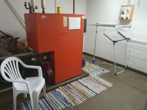 Beheizter Raum zum Trocknen von nassen Sachen wie Schuhe, Skischuhe oder Kleider