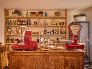 Local specialities can be bought in the kiosk by the house