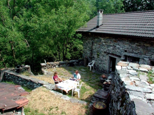 Ferienhaus Wild Valley Waterfall Rustico Garten