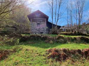 Maison de vacances Wild Valley Waterfall Rustico Vue de la maison été