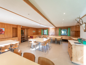 Ferienheim Hüschera Lodge Esszimmer