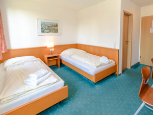 Seminar- und Gästehaus Schieferpark Schlafzimmer
