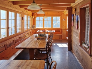 Mountain hostel Tschingelhorn Dining and lounge room