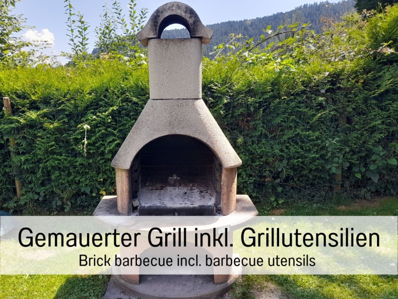 Ferienhaus Historisches Waldhaus Grillstelle