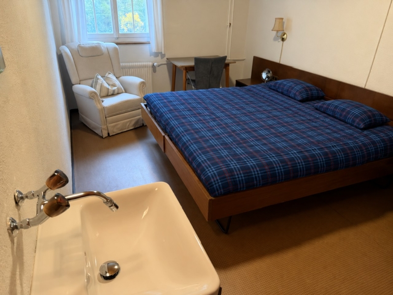 One of the twin rooms
