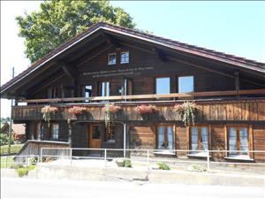 Group accommodation Chalet Aeschi House view summer