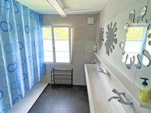 Gruppenhaus BlueTurtle am See Badezimmer
