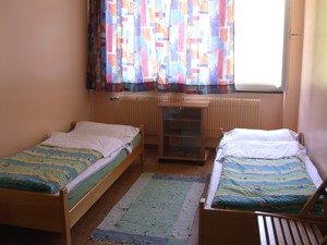 Gästehaus Auberge pour tous Schlafzimmer